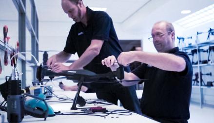 Key partnerships: A couple of engineers producing a drone in a laboratory
